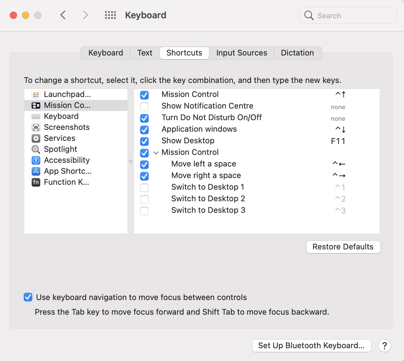 The macOS Keyboard Shortcuts settings showing "Use keyboard navigation to move focus between controls" selected