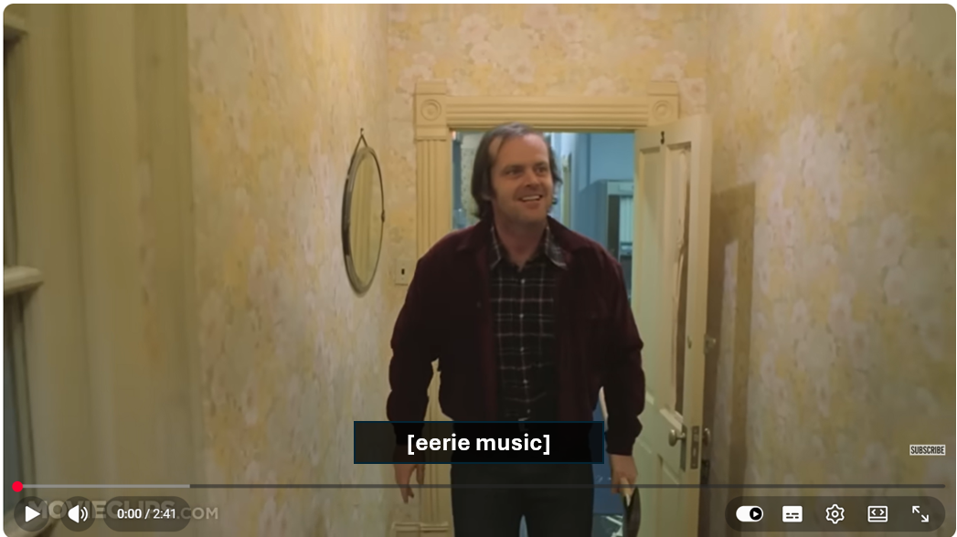 A scene from The Shining with captions visible. Captions read "[eerie music]"