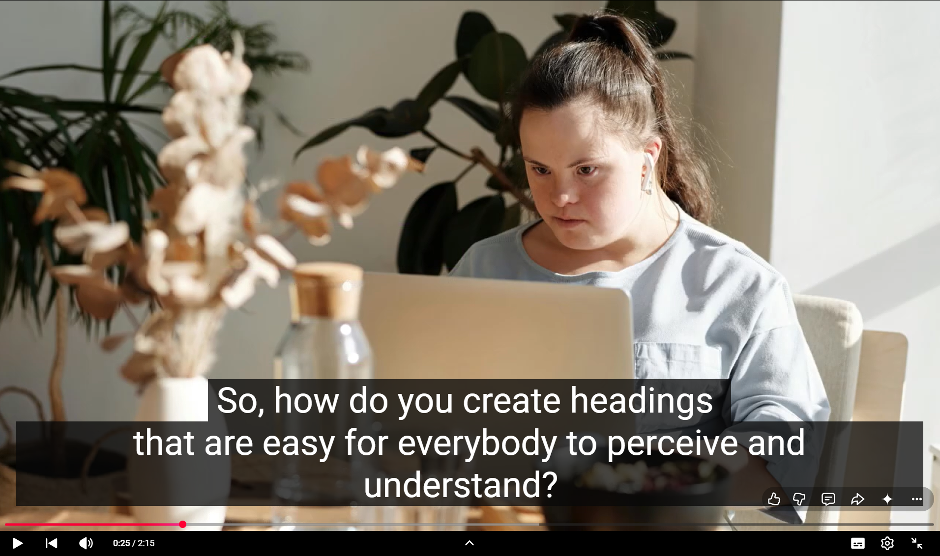 The YouTube player, with enlarged captions on