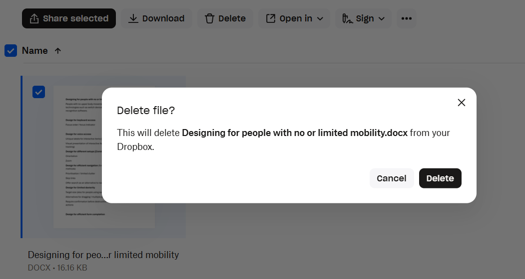 The Dropbox website. A dialog titled "Delete file?", containing the text "This will delete Designing for people with no or limited mobility.docx from your Dropbox" and a Cancel and Delete buttons is on screen
